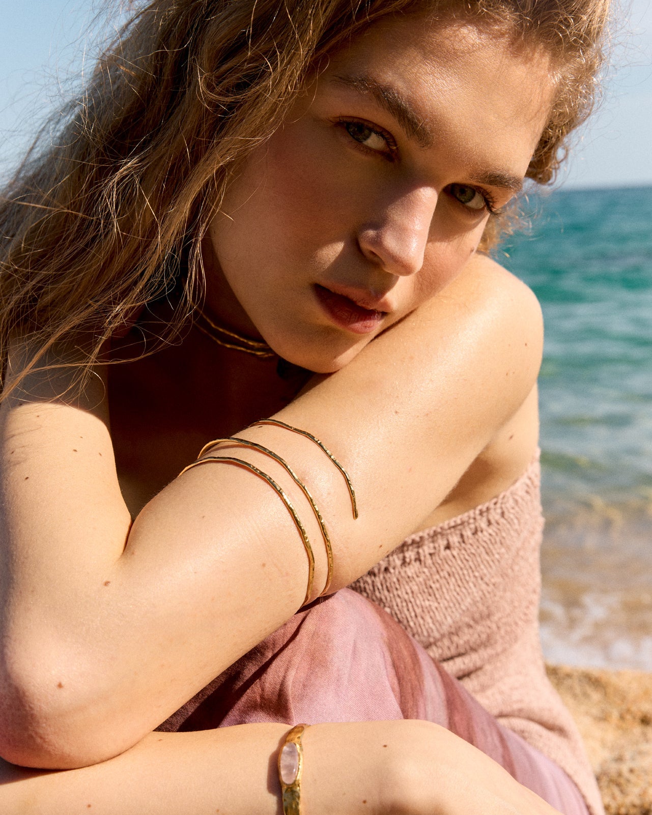 Editorial fashion lookbook featuring an elegant model showcasing a handcrafted minimalist silver necklace by Barcelona designer Júlia Duran.