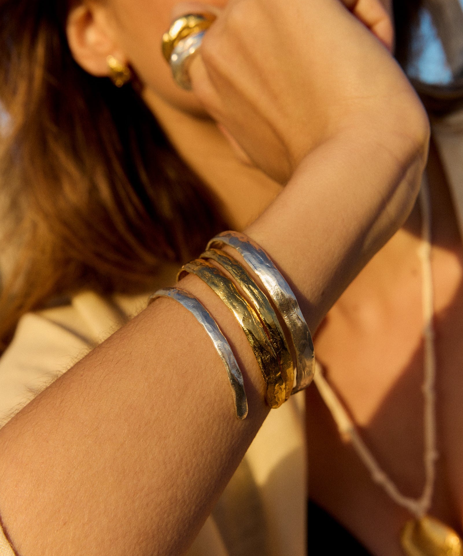 Handmade gold-plated and silver bracelets
