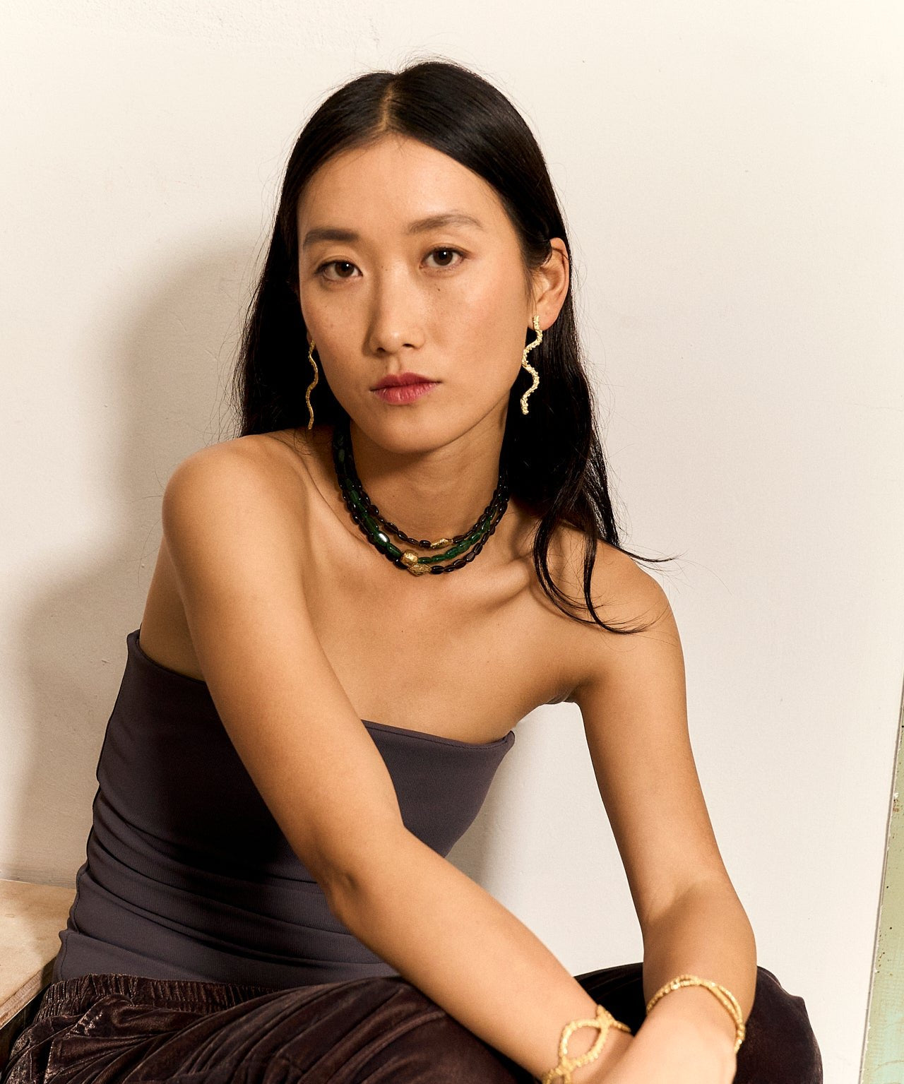 beaded necklace with aventurine stones. organic tetxures and gold plated